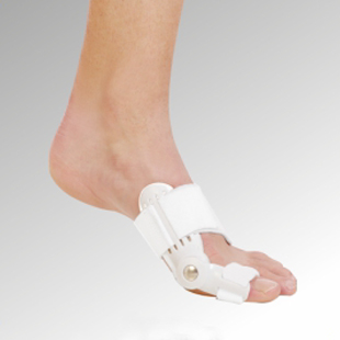 A person wears a white Bunion Brace