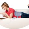 A woman relaxing with Heating Pad Tynor